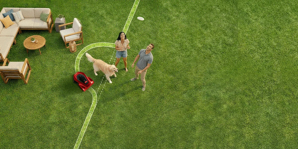 iGarden L AWD Series robot lawn mower safely navigating a large lawn while family and pets play
